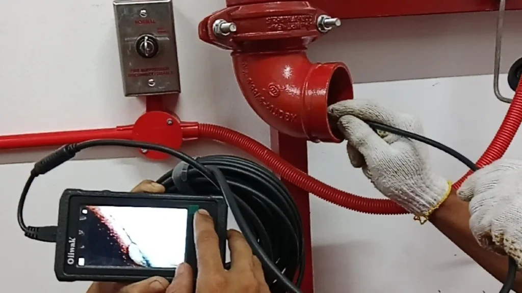 Endoscopic Camera Examines Internal FM200 Cylinder
