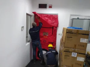 Pengujian Door Fan Test (Room Integrity Testing / Blower Door) di ruang Server PT Softex Indonesia yang berlokasi di Sidoarjo, Jawa Timur.