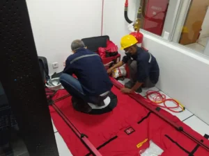Pengujian Door Fan Test (Room Integrity Testing / Blower Door) di ruang Server PT Softex Indonesia yang berlokasi di Sidoarjo, Jawa Timur.